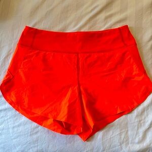 Athleta running short in neon orange - S - new but without tags